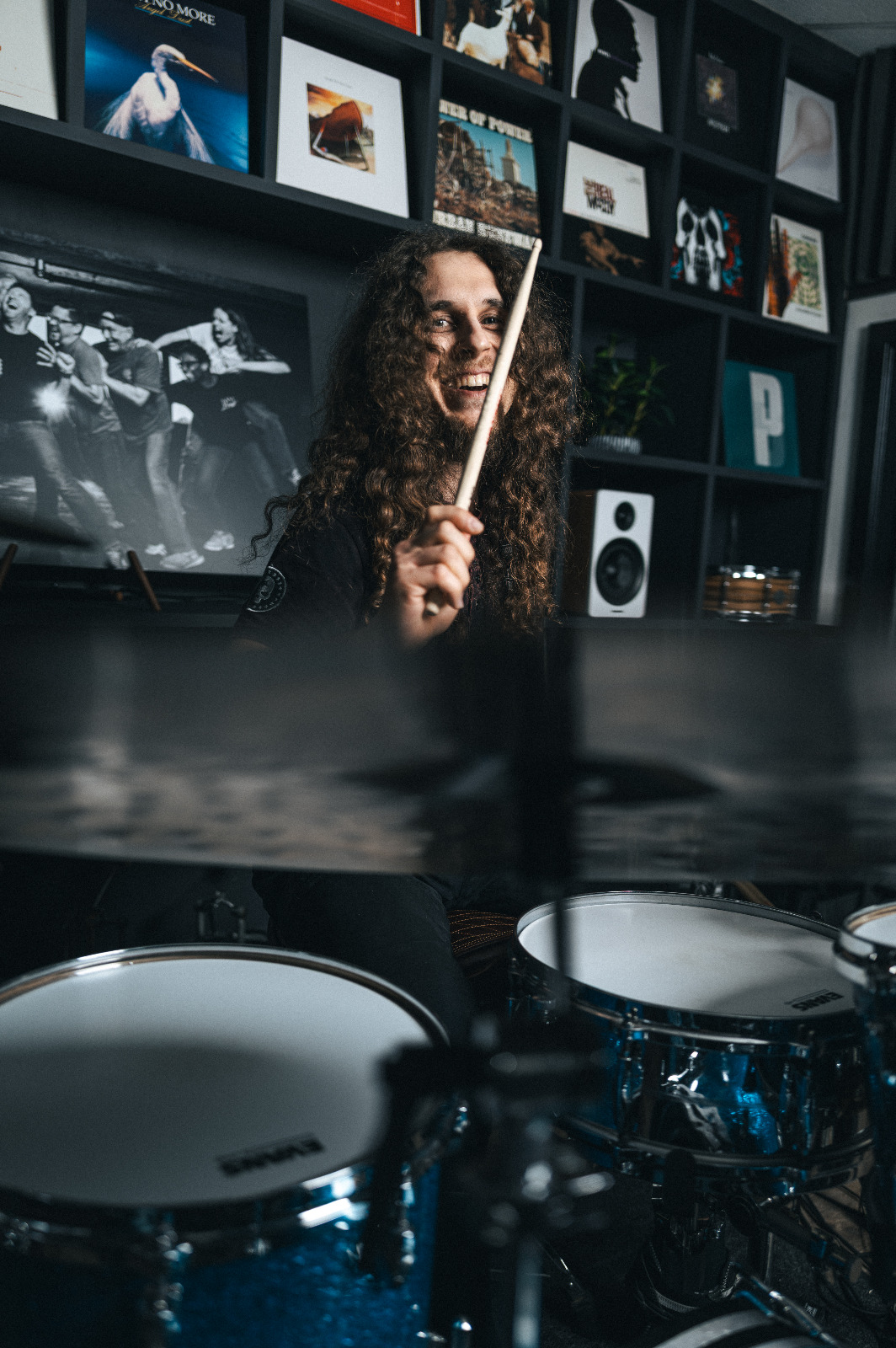 Nikolai Schlott smiling at the drums